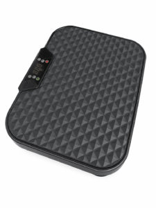 Compact black Doon vibration platform side view, featuring LCD control panel and diamond-textured surface