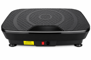 Back view of Doon vibration plate showing power switch, socket, and safety warning label