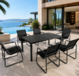 Doon black carbon steel 6-seater outdoor dining set, minimalist metal patio furniture on luxury seaside villa pool terrace with ocean view
