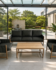 Modern outdoor furniture set by DOON: weather-resistant black sofa, armchairs, and wooden coffee table for patio and garden spaces.